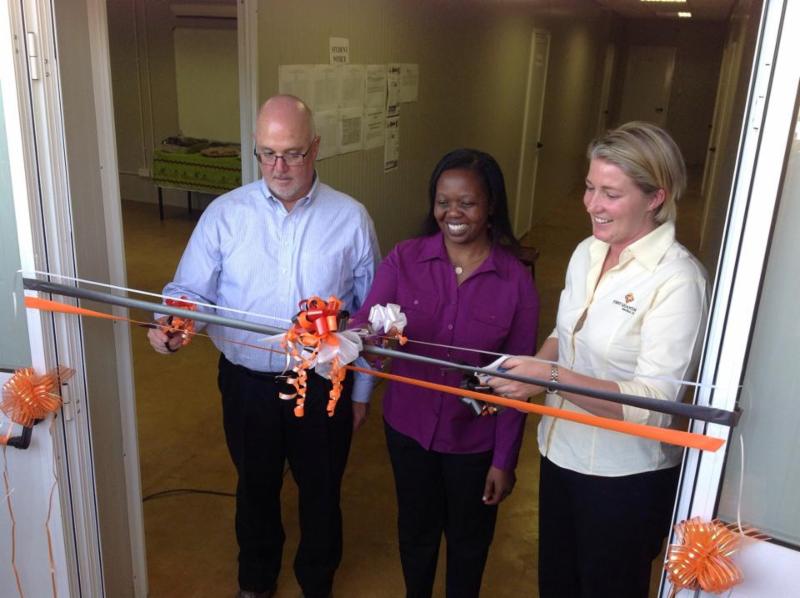Doreen Zimba cuts the ribbon to open the Northrise University School of Nursing in Solwezi.