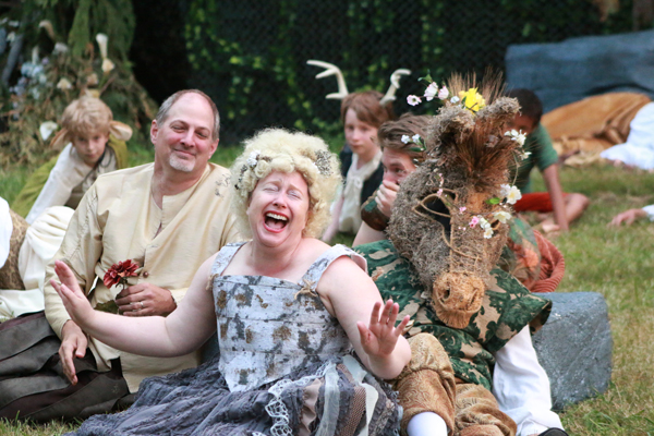 Oberon (Joel Underwood) and the Fairies watch the spell take hold as Titania (Kristi Ann Jacobson) becomes deliriously enamored with Bottom (Gary Fetterplace). Photo: Kim Scott-Olson.