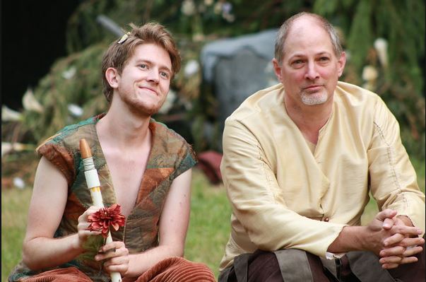 Puck (Austin Bennett) and Oberon (Joel Underwood) enjoy a quiet moment during the final scene. Photo: Kim Scott-Olson.