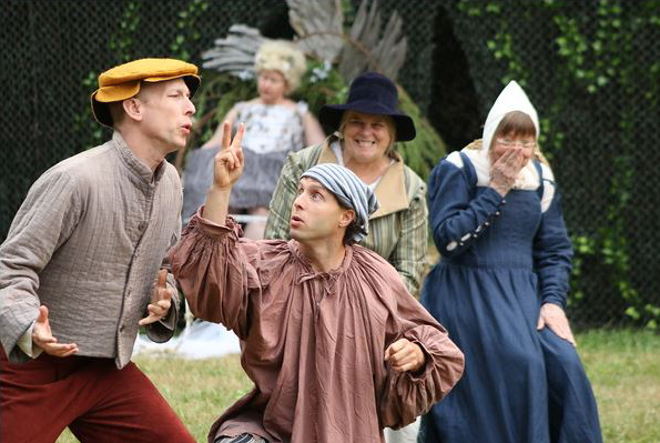 Bob Downing as Thisbe, with Chris Lane as Wall rehearse the 