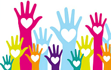 Hands held up to volunteer