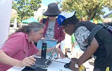 Library card sign-ups at Sunday Streets