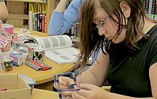 Teen creating art project