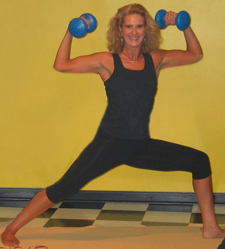 Jackie in yoga with bicep curls