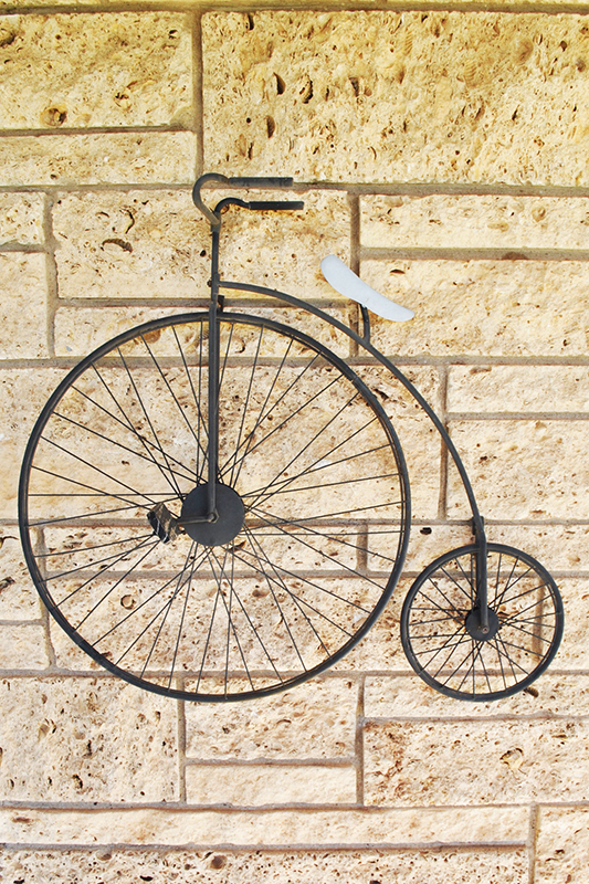 A sculpture depicting J. W. Murray's high-wheeled bicycle, Crosby County Pioneer Museum, Crosbyton