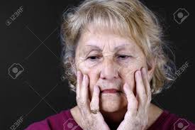 older woman looking worried