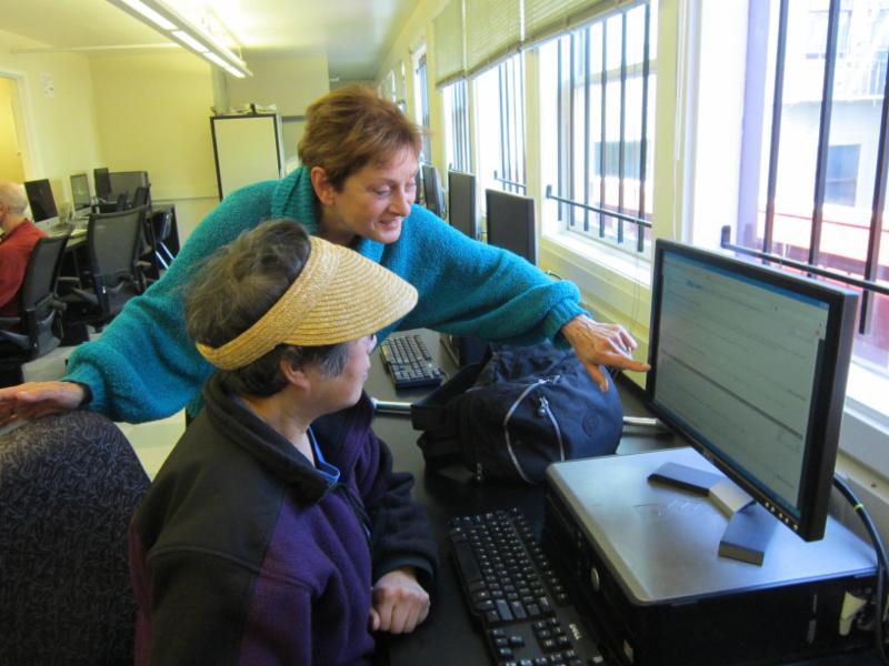 CLC Tutor with Senior at computer