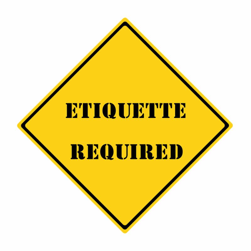 A yellow and black diamond shaped road sign with the words ETIQUETTE REQUIRED making a great concept.