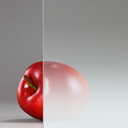 image of ultra-white fade glass with apple in background