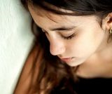 Close-up of girl looking down