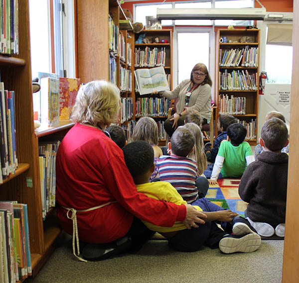 Cathy Guertin reads to the Polar Bears Kindergarten class.