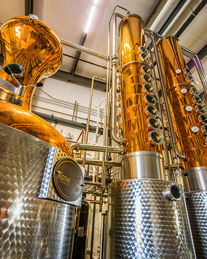 A custom-built copper still is the centerpiece of Backwards Distilling ...