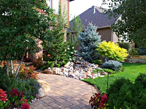 A colorful and lush landscape adds value and curb appeal to your home