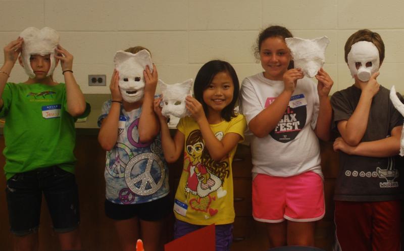 Young Artist with masks