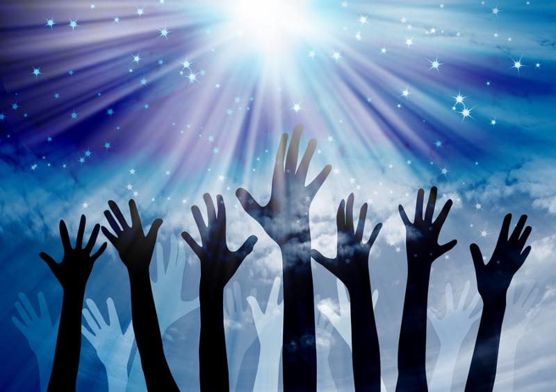 Hands reaching in the sky with star background