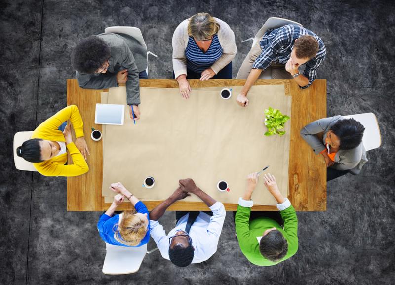 Multi-Ethnic Group of People in a Meeting and Copy Space